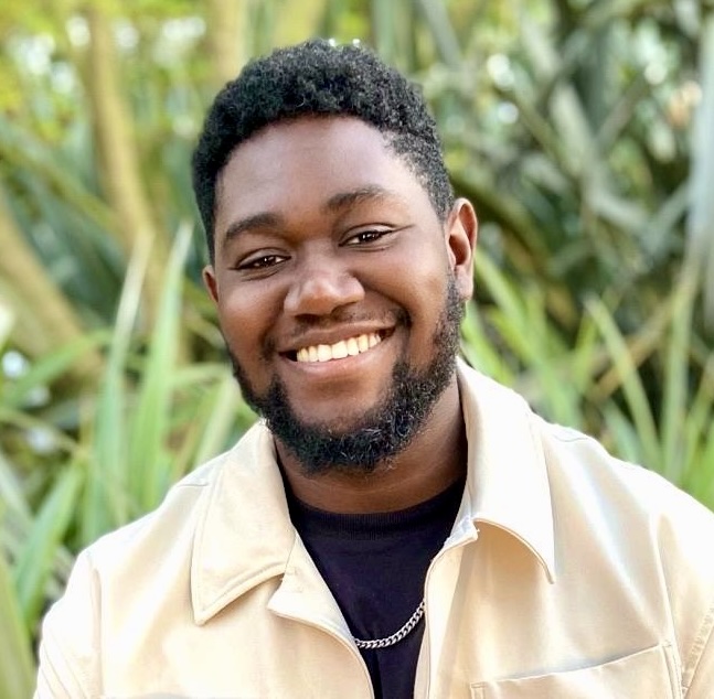 Gideon Twum smiling portrait at sunset